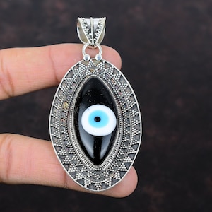 Colgante de ojo malvado de plata esterlina hecho a mano: joyería de piedras preciosas negras