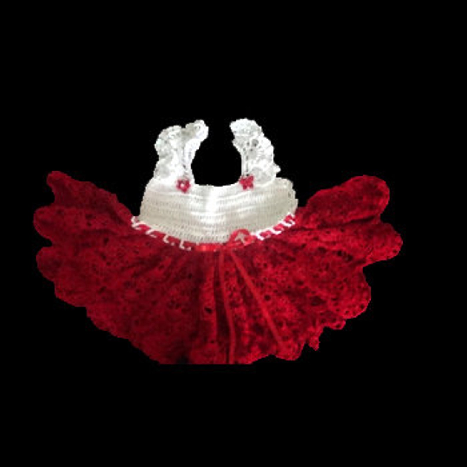 white gown with red ribbon