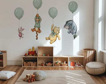 May include: Wall decals featuring Piglet, Tigger, Winnie the Pooh, and Eeyore, each holding a light green balloon. The characters are illustrated in a soft, classic style and are positioned floating against a plain white wall.