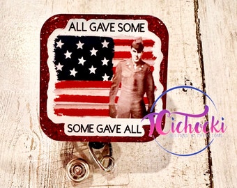 May include: Red glitter background with a white and red American flag and a soldier in uniform. The text "All Gave Some Some Gave All" is printed on the image.