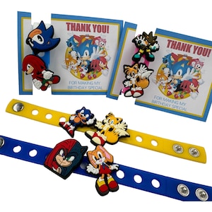 Bomboniere a tema Sonic, ciondoli a forma di riccio e braccialetti regalo/sacchetti regalo, bracciale da 7'' con 2 ciondoli ciascuno (set da 6, 12, 18 o 24)