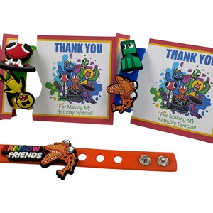 May include: Rainbow Friends themed party favors with a thank you card that says "For Making My Birthday Special!" and a bracelet with a rainbow friends charm.