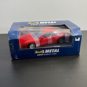 BMW 850CSi Red 1:18 Scale, Revell, Metal Die Cast, Toy Car Vintage Die-cast, Metal with Plastic Parts, Original Box, Excellent Condition.