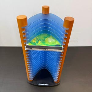 Vintage Early 90s 20 ATLANTIC CD tower stand, blue and imitation wood.