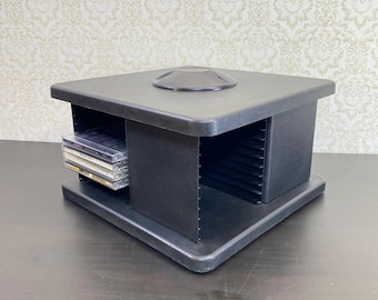 Rotating Compact Disc Rack CD Holder, Carousel Cassette rack, Audio Storage, DVD. Black Storage, cassette box, audio cassette Strong Case.