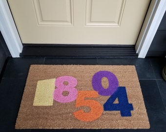 Colorful house numbers on welcome mat, Colorful outdoor mat with house numbers, Fun colorful entry mat, Bright colored welcome mat, Fun mat