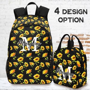 May include: Black backpack and matching lunch bag, both adorned with a sunflower pattern. The backpack and lunch bag feature the name "Margery" and a large white "M". The text "4 DESIGN OPTION" is visible in the background.