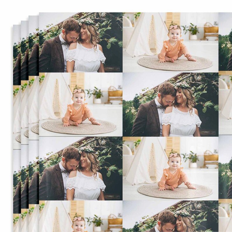May include: A collage of photographs featuring a couple and their baby. The couple are dressed in formal attire, whilst the baby is wearing a peach-coloured onesie. The photographs are set against a backdrop of greenery and a white teepee.