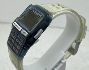 1990s Casio Micro Cosmos DBC-63 (module 1276) / Calculator