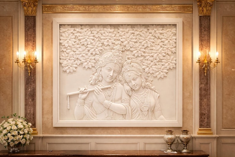 May include: A white relief sculpture of two figures, one playing a flute, set within a framed panel. The figures are adorned with ornate jewelry and headdresses. The artwork is mounted on a wall with decorative molding and sconces.