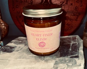 Heart-Fixer Elixir Candle for Heartbreak featuring Enchanted Story and Incantation