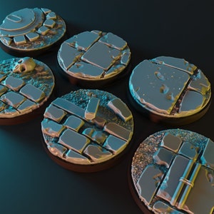 May include: Six round, gray, textured, plastic gaming bases with different designs. The bases are for use in tabletop role-playing games.