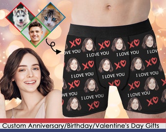 May include: Black boxer shorts with a repeating pattern of a red heart and the text "I love you".