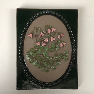 Jie Gantofta ceramic wall plaque with pink Linea flower motif, design Aimo Nietosvuori Sweden 1960s