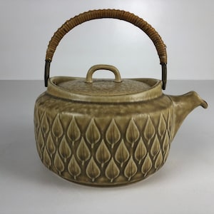 Beautiful Jens Quistgaard Relief tea pot. Mid-Century Modern design.
