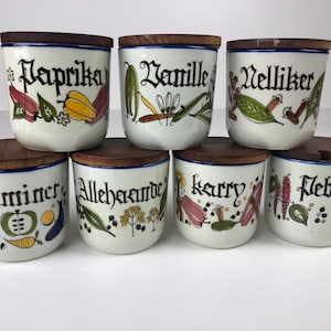 Vintage 70s handpainted spice jars with a teak lid. Fom the Pernille series. Manufactured by Knabstrup Ceramics, Denmark.