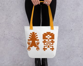 Bolsa de tela blanca y asas amarillas. Diseño de arte precolombino en color azafrán. Original tote bag