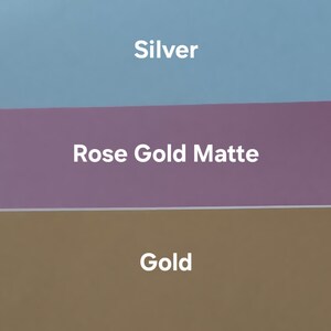May include: Three swatches of vinyl adhesive paper in different colors: silver, rose gold matte, and gold.