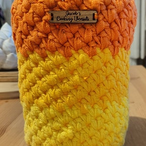 A tall/small orange and yellow basket