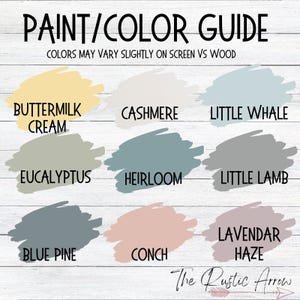 May include: A paint color guide with nine color swatches. The colors include Buttermilk Cream, Cashmere, Little Whale, Eucalyptus, Heirloom, Little Lamb, Blue Pine, Conch, and Lavendar Haze. The text "Paint/Color Guide" is at the top.