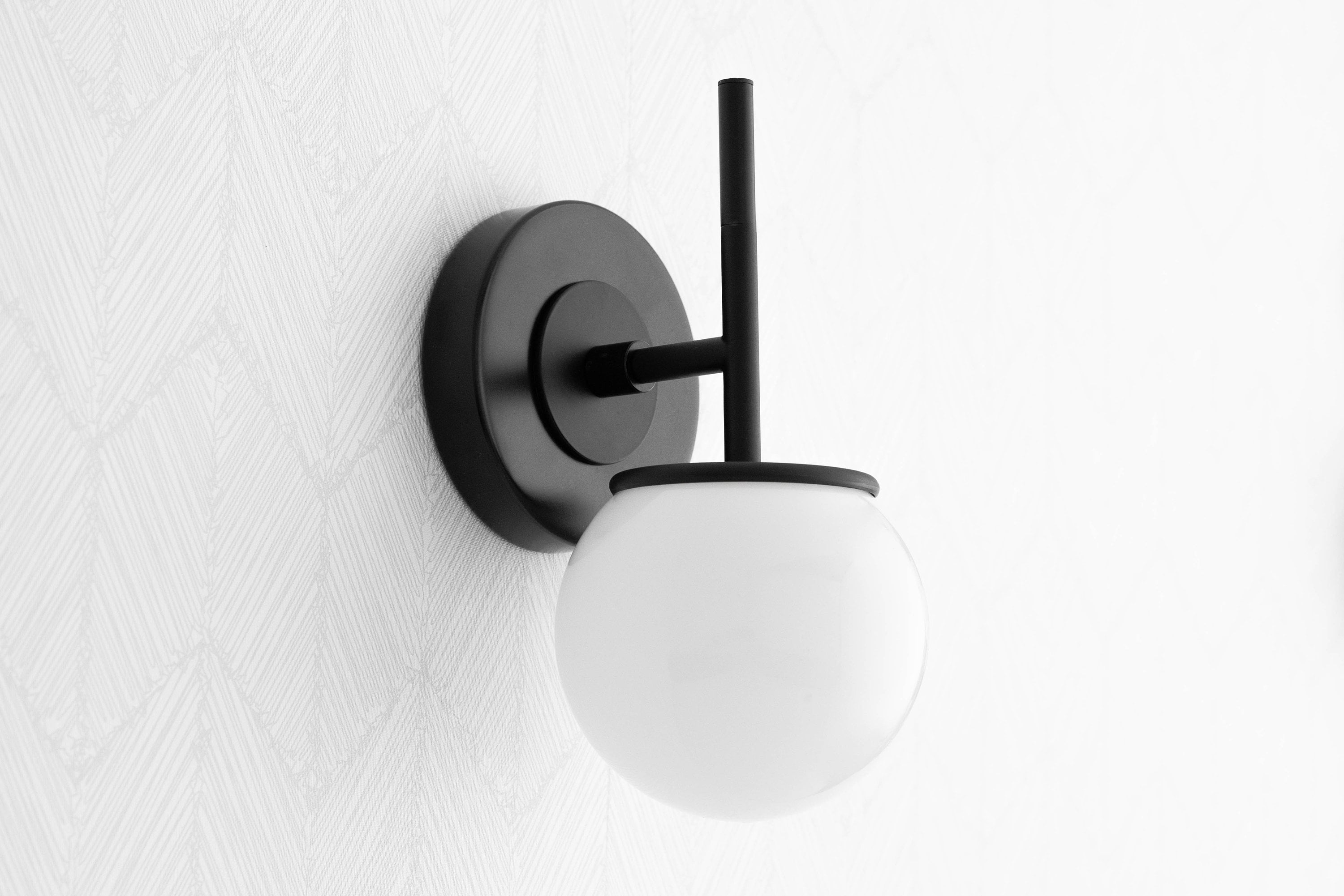 Globe sconce black deals