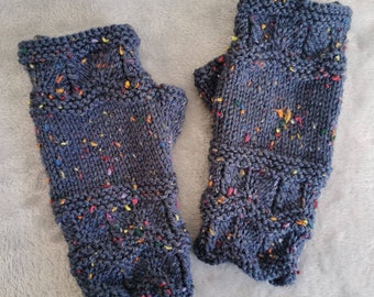 Women's fingerless gloves/wrist warmers in blue with multicolour flecks.