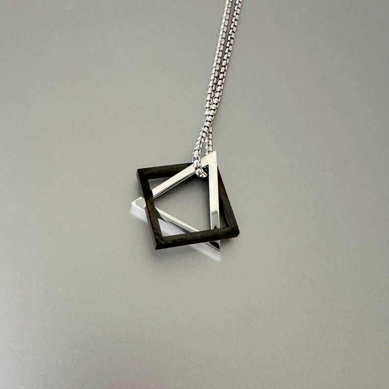 interlocking square triangle geometric necklace