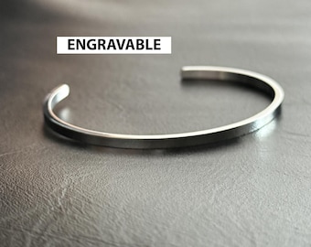 Pulsera tipo brazalete de acero inoxidable de 3 mm personalizada con grabado a medida.