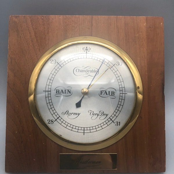 Vintage Weatherman changeable walnut barometer.