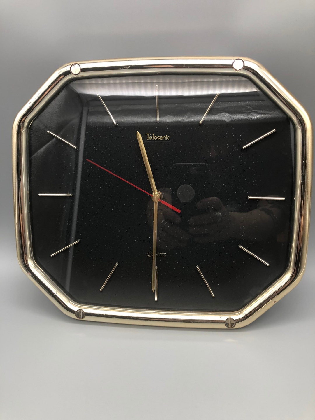 Vintage Telesonic Plastic Wall Clock. Black and Gold. Battery Operated