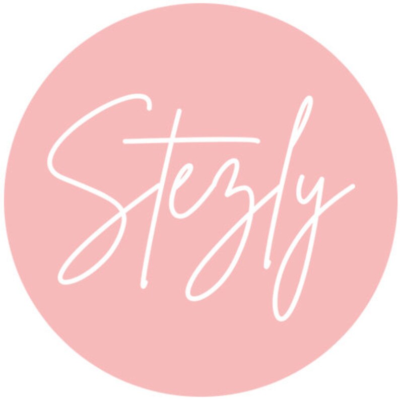 May include: A pink circle with the word "Stezly" written in white cursive script.