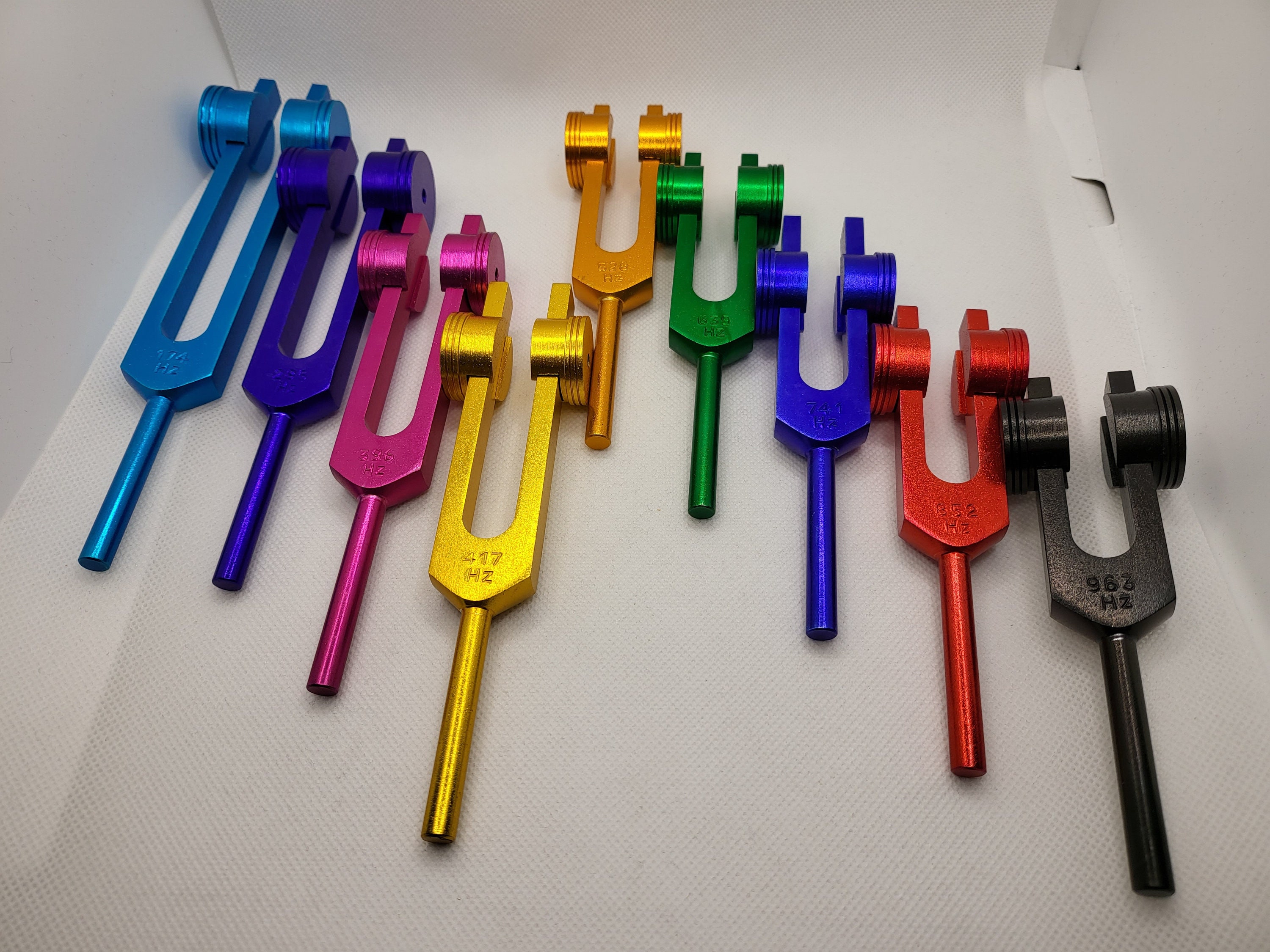 Weighted Sacred Solfeggio 9 Set Color Tuning Forks with Activator and Velvet Pouch
