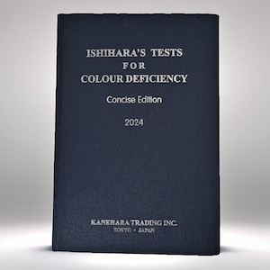May include: A dark blue book titled "Ishihara's Tests for Colour Deficiency, Concise Edition 2024" by Kanehara Trading Inc., Tokyo, Japan.