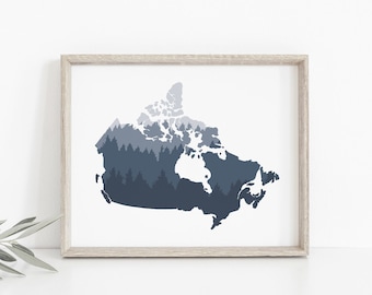 May include: A framed print of a blue and white silhouette of Canada with a forest design.