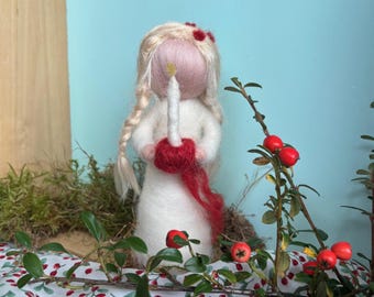 Felt figure of a winter girl with a Christmas apple and candle, needle-felted, Waldorf-inspired felt figure for Christmas, boy with apple
