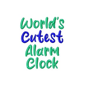 May include: Green and blue text on a white background reads "World's Cutest Alarm Clock".