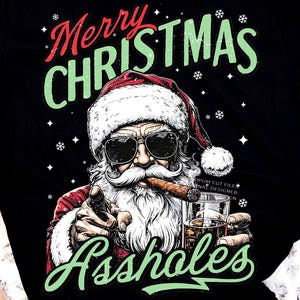 May include: Black t-shirt with a graphic of Santa Claus wearing sunglasses, smoking a cigar, and holding a glass of whiskey. The text reads "Merry Christmas Assholes" in red and green. The image includes snowflakes.