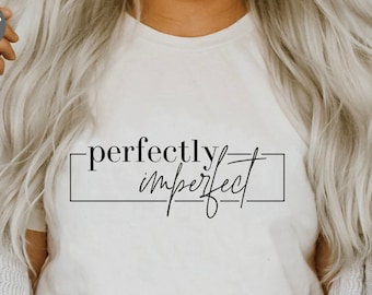 May include: A white t-shirt with the text "perfectly imperfect" in a black box.