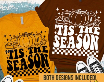 May include: Two t-shirt designs with the text "Tis the Season" in a retro font. One design features a pumpkin and fall-themed elements in white on a brown shirt. The other design features a pumpkin and fall-themed elements in black on a yellow shirt.