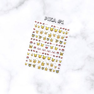May include: A sheet of nail art stickers featuring various yellow Pikachu designs, red watermelon slices, and Poke Balls. The sheet is labeled "PIKA #1" in black and white text. The stickers are on a white background.
