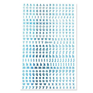 May include: A sheet of blue and white alphabet stickers. The stickers include uppercase and lowercase letters, with a variety of fonts. The text "ZS-101" is printed on the sheet. The stickers are arranged in rows and columns.