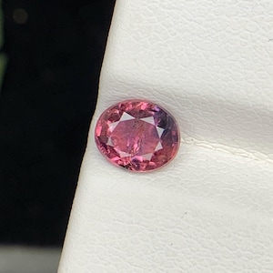 Natural Unheated Winza Sapphire: 0.85 Carat Oval Bi-Color Gemstone (Tanzania)