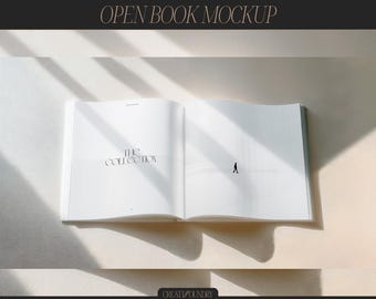 May include: Open book mockup with the text "The Collection" on the left page and a silhouette of a person walking on the right page. The book is laying flat on a white surface.