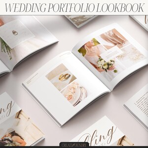 May include: A wedding portfolio lookbook with a white background. The book is open to a page with a photo of a bride and groom. The book is surrounded by other books and a white background.