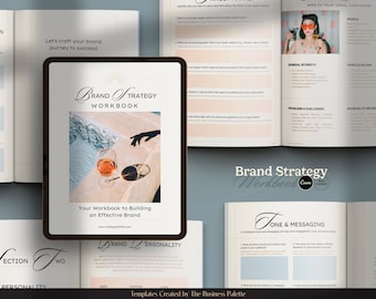 May include: A digital tablet displays a "Brand Strategy Workbook" with the text "Your Workbook to Building an Effective Brand." The image includes open workbooks and a glass of wine, suggesting a business and lifestyle theme.