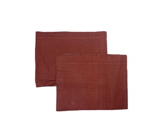 May include: Two red kitchen dish towels with a white polka dot pattern.