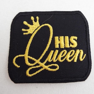 May include: Black fabric patch with gold embroidery. The patch features a crown and the words "His Queen".