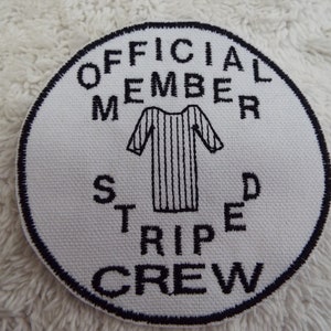 May include: White round patch with black embroidered text that reads "Official Member Striped Crew" and a black and white striped shirt graphic.