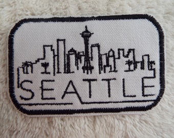 Parche de hierro bordado del horizonte de la ciudad de Seattle