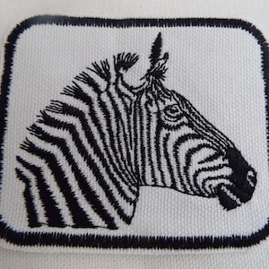 Zebrabroderi Stryklapp